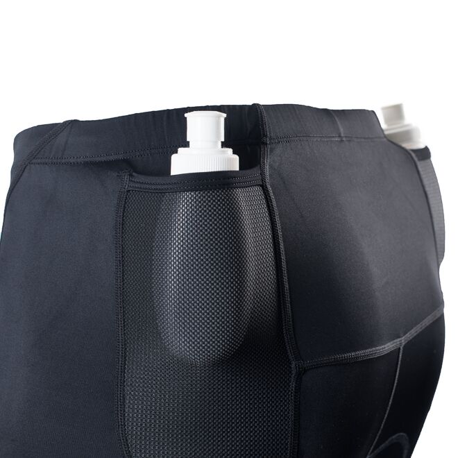 Black Triathlon shorts on white background pockets close up