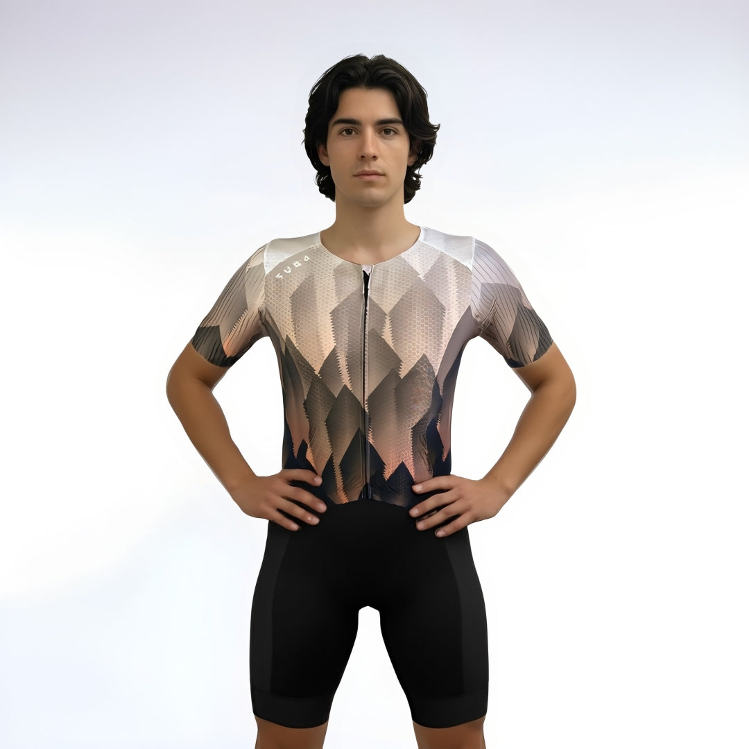 Person wearing a patterned Triathlon suit on a plain background