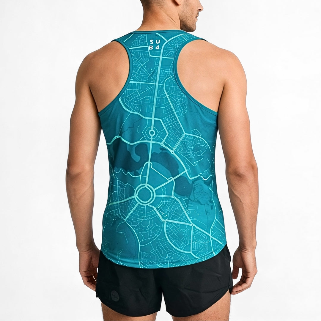 Person wearing a blue tank top racerback singlet with Canberra map design on a plain background