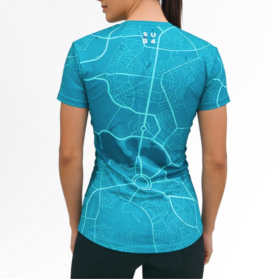 Person wearing a blue athletic running shirt with a Canberra map design on the back