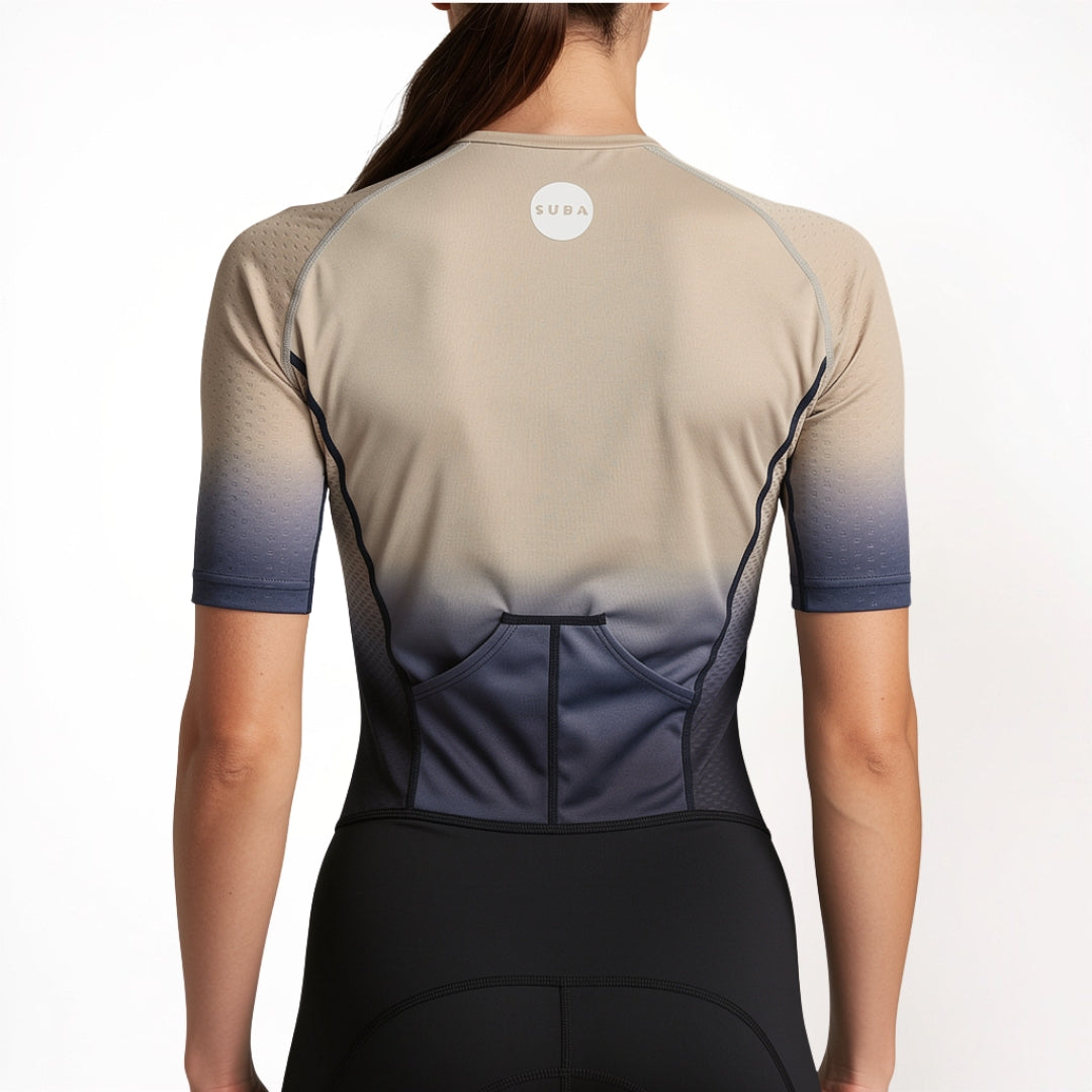 Beige and black cycling jersey with gradient design on a white background