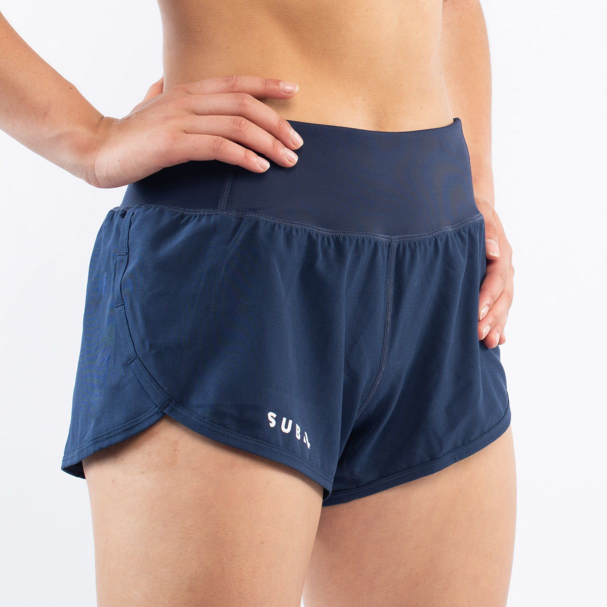 Navy blue athletic running shorts with a SUB4 logo on a white background