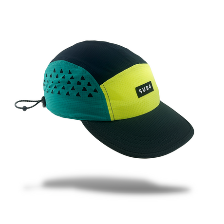 A color-blocked panel running cap by SUB4, featuring a dark navy crown, a teal rear panel with black triangle patterns, a bright yellow-green front panel, and a matching dark brim with a SUB4 logo patch.