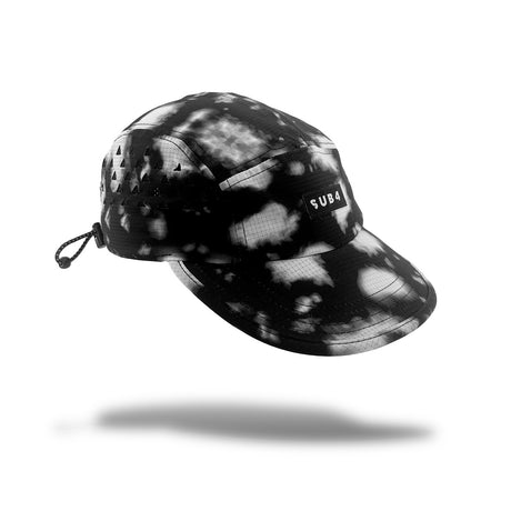 A black and grey running cap with a small white 'SUB4' logo patch on the side, shown floating against a white background with a soft shadow underneath.