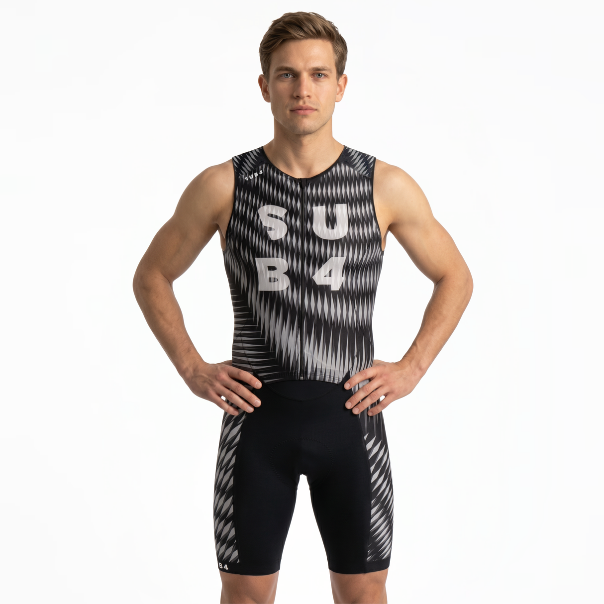 A male athlete modeling a sleeveless black and white patterned triathlon suit with 'SUB4' printed on the chest, against a plain white background.