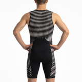 Rear view of a man wearing a sleeveless athletic tri-suit with a black and white geometric pattern, set against a plain white background.