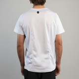Person wearing a white t-shirt with a small SUB4 logo on the back against a white background
