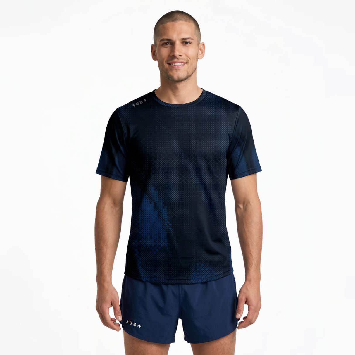 Person wearing a black running t-shirt with navy patterns and navy running shorts on a white background