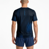 Back view of person wearing a black running t-shirt with navy patterns and navy running shorts on a white background