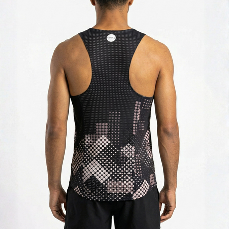 Person wearing a black tank top with geometric pattern on a white background