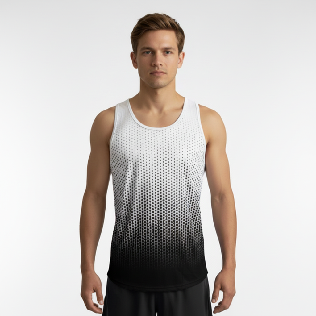 Man wearing a white and black dot geometric gradient tank top on a light gray background