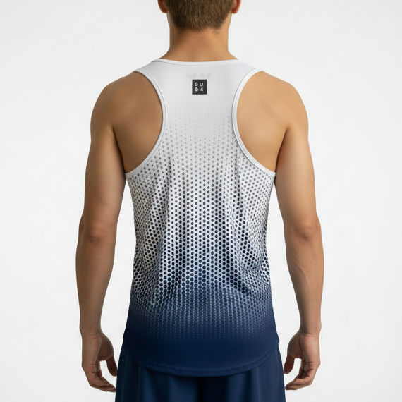 Person wearing a white and blue dot geometric gradient tank top on a plain background