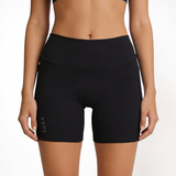 SUB4 black athletic shorts worn by a person on a white background