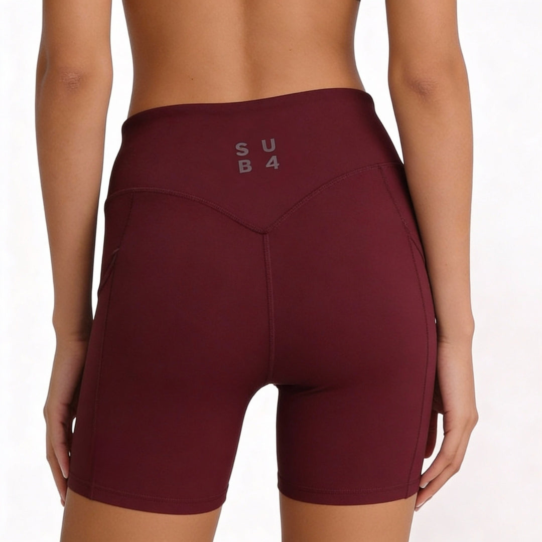Maroon athletic shorts with 'SUB4' branding on a white background