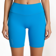 SUB4 blue athletic shorts worn by a person on a white background