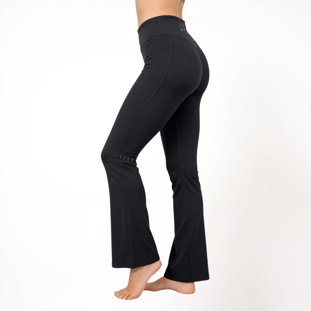 Black athletic yoga pants on a white background