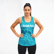 Woman wearing a blue tank top singlet with 'Canberra' printed on it against a white background