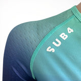 Teal Tri Suit material close up  with 'SUB4' branding on a white background