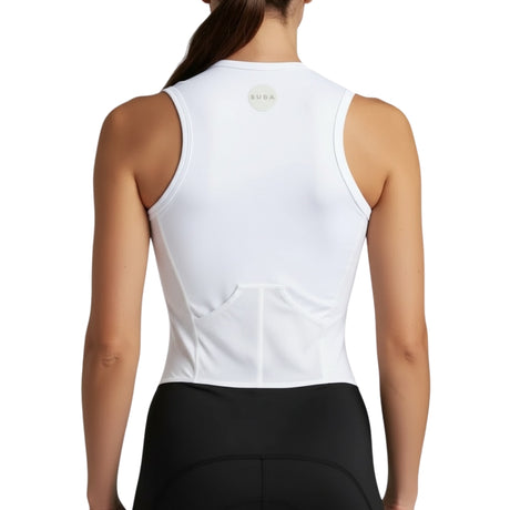 White sleeveless top worn by a person on a white background