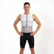Man wearing a white sleeveless Triathlon outfit with black shorts on a white background