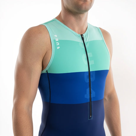 Person wearing a blue and green Tri Suit outfit with a visible brand logo.